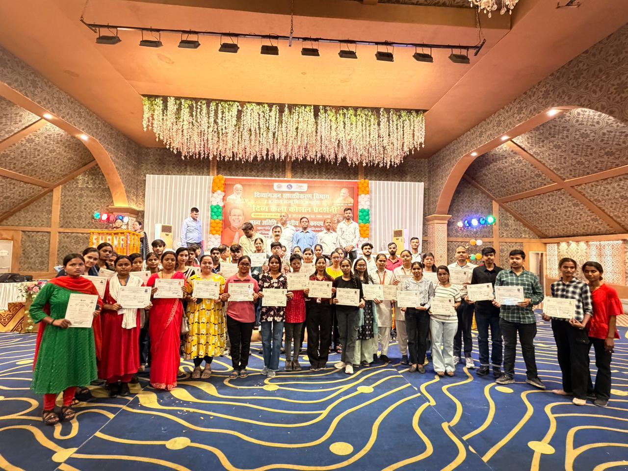 Students with certificates at award ceremony